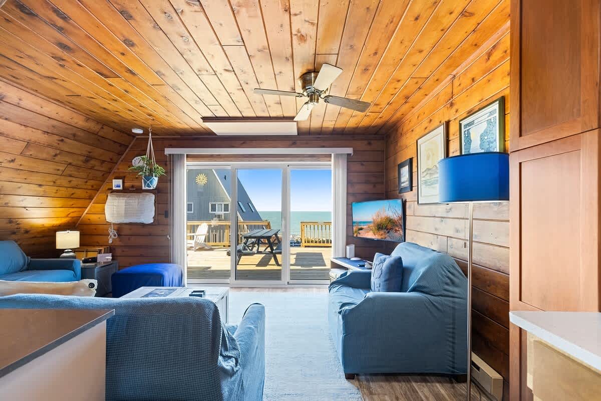 Our living room opening directly to the outdoor deck and endless horizon.