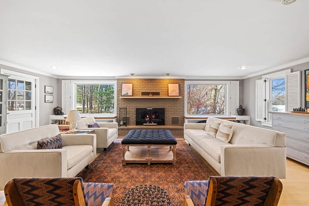 The Farmhouse's spacious living room is perfect for games, stories, and fireside nights.