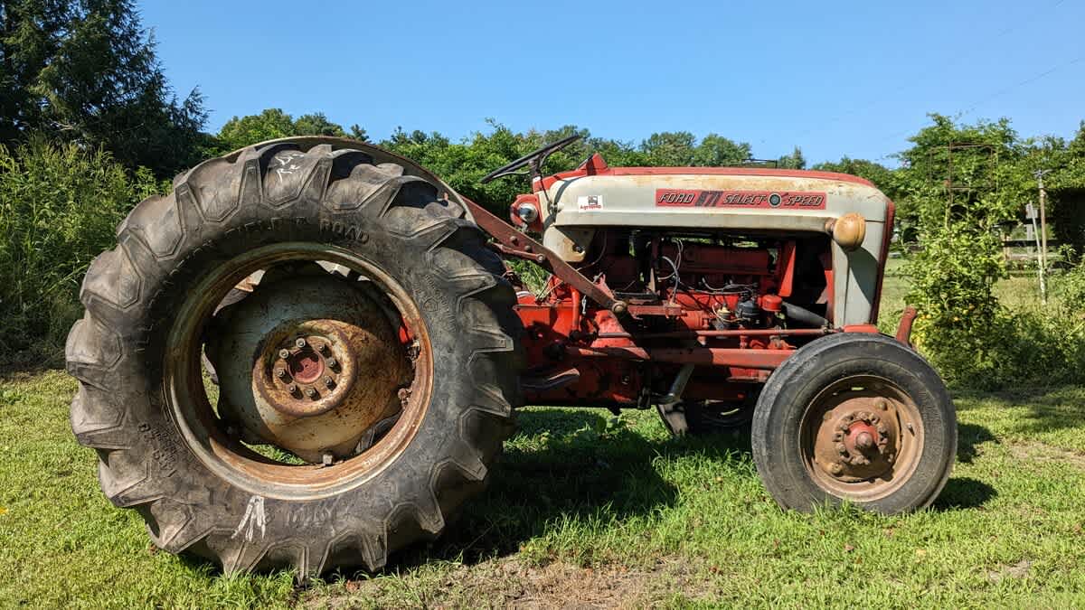 Farmstead character at Berrywood Farm, complete with our vintage tractor mascot.