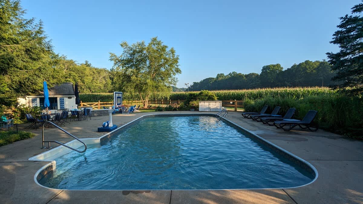 Unwind poolside with open-sky views and plenty of space to lounge.