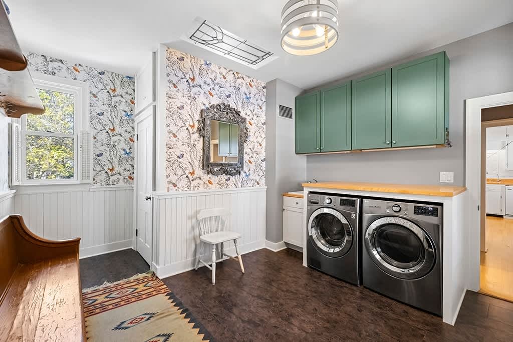 Cheerful mudroom + laundry ready for boots, coats, and resets at The Farmhouse.