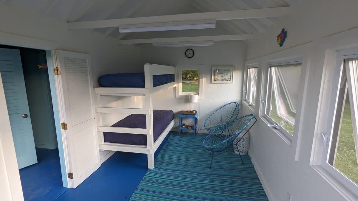 Cool off in the cozy poolhouse for games, reading, and mid-swim breaks.