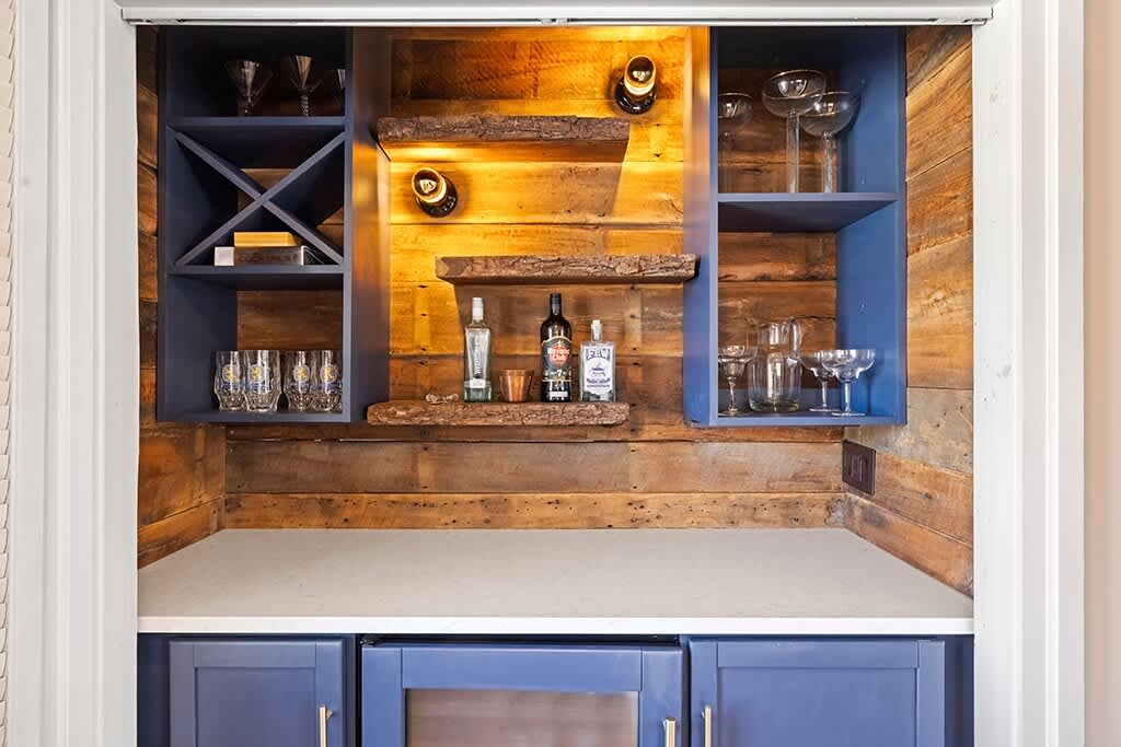 Pour, mix, and enjoy in this intimate bar nook at The Farmhouse.