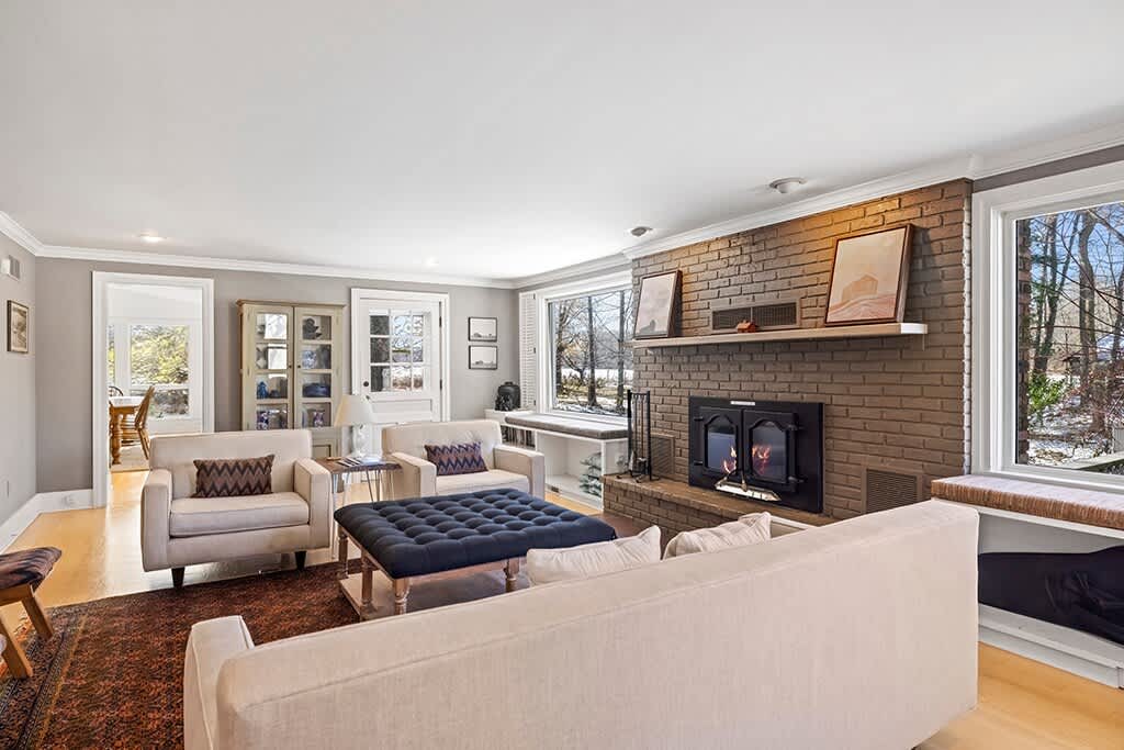 A welcoming living room designed for cozy nights at The Farmhouse.