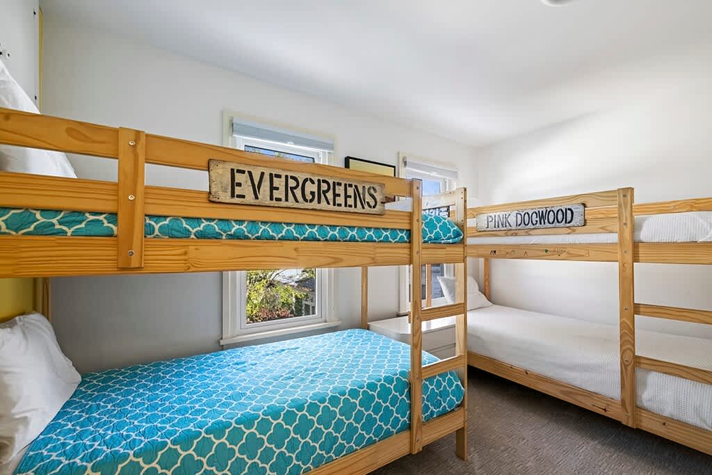 Bedroom 3 in The Farmhouse is on the upper level and has 2 twin-size bunkbeds.