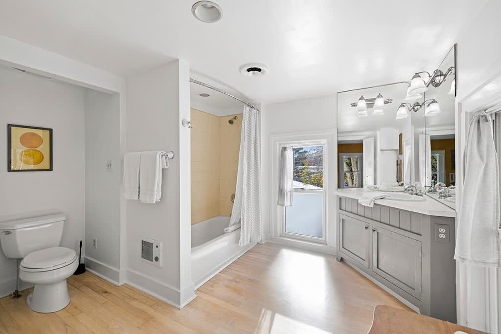 Airy bath with peaceful views and plenty of room to unwind.