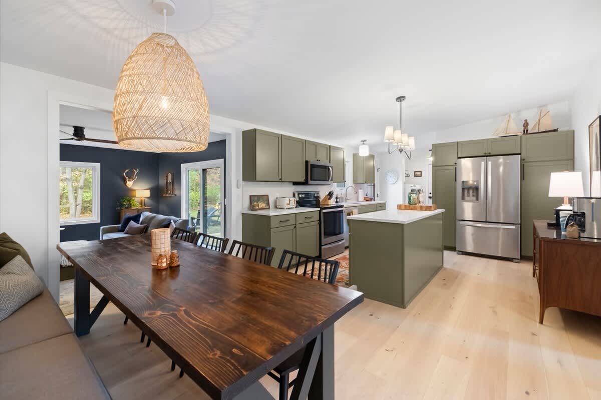 The kitchen opens to both lounges, keeping everything within easy reach.