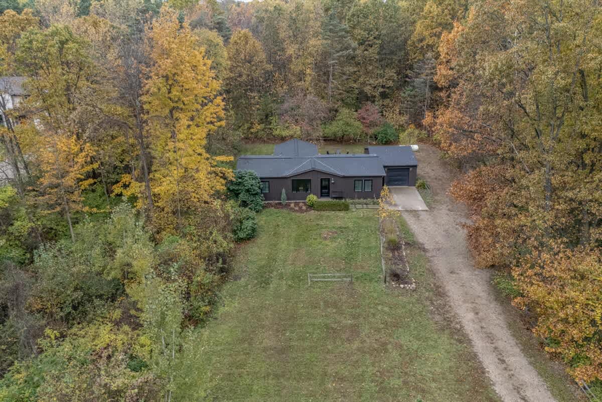 A refined woodland hideaway near Saugatuck and Lake Michigan.