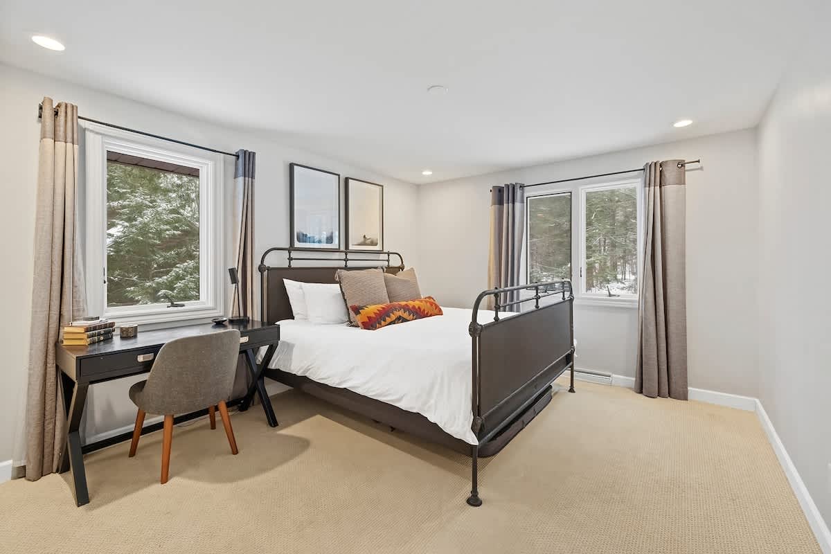 Bedroom 3 is on the upper level and has a queen-size bed.