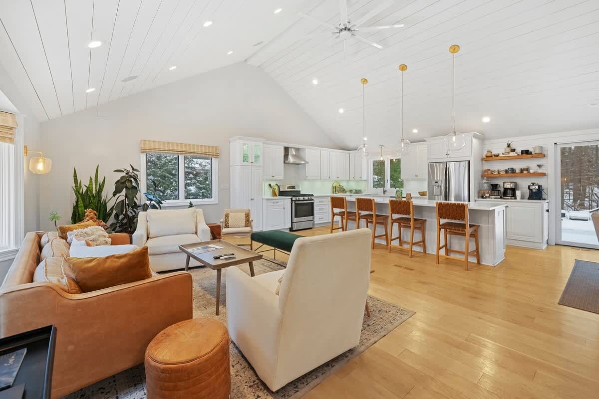 A bright gathering space where cooking, lounging, and living come together.