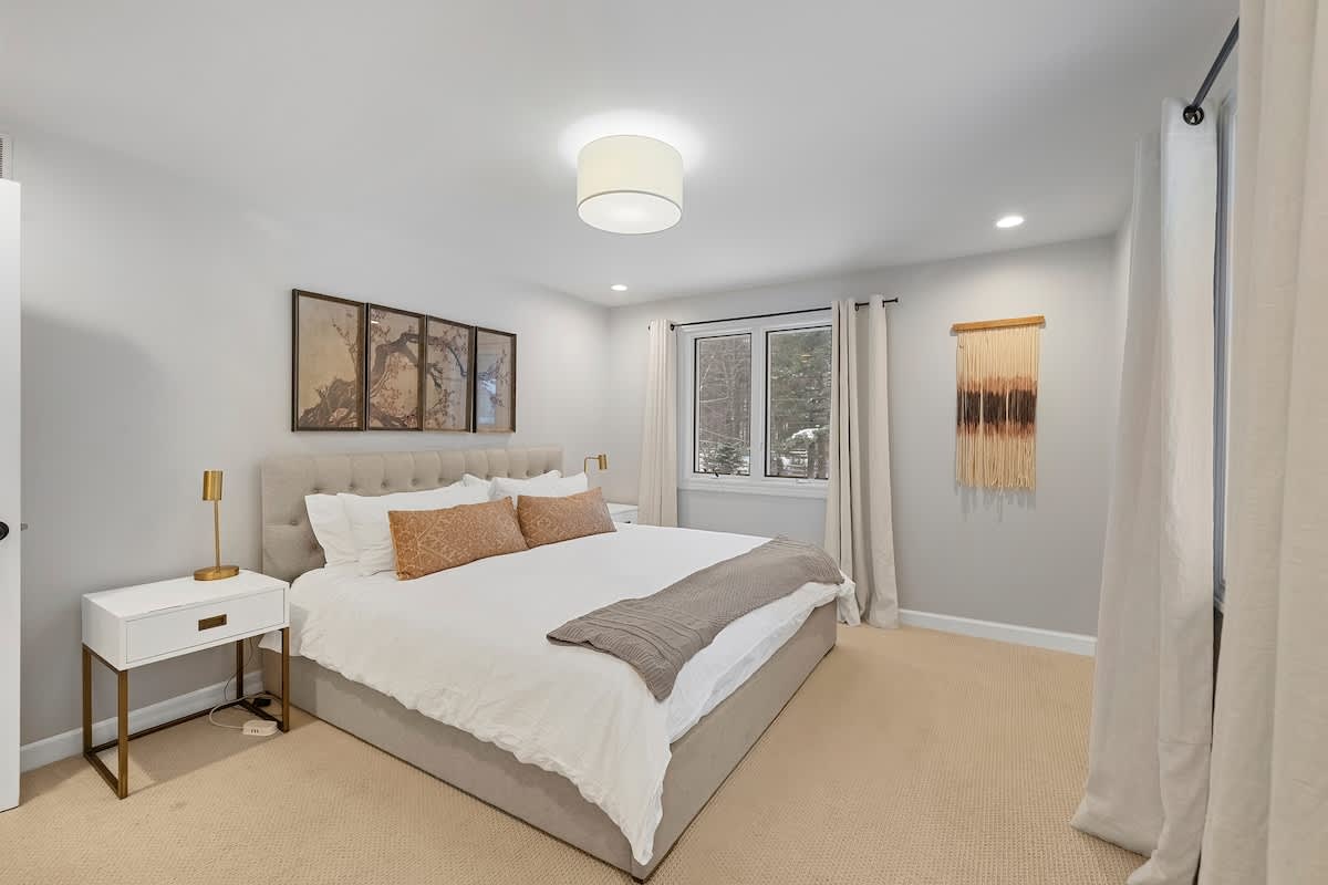 Bedroom 2 is on the upper level and has a king-size bed.