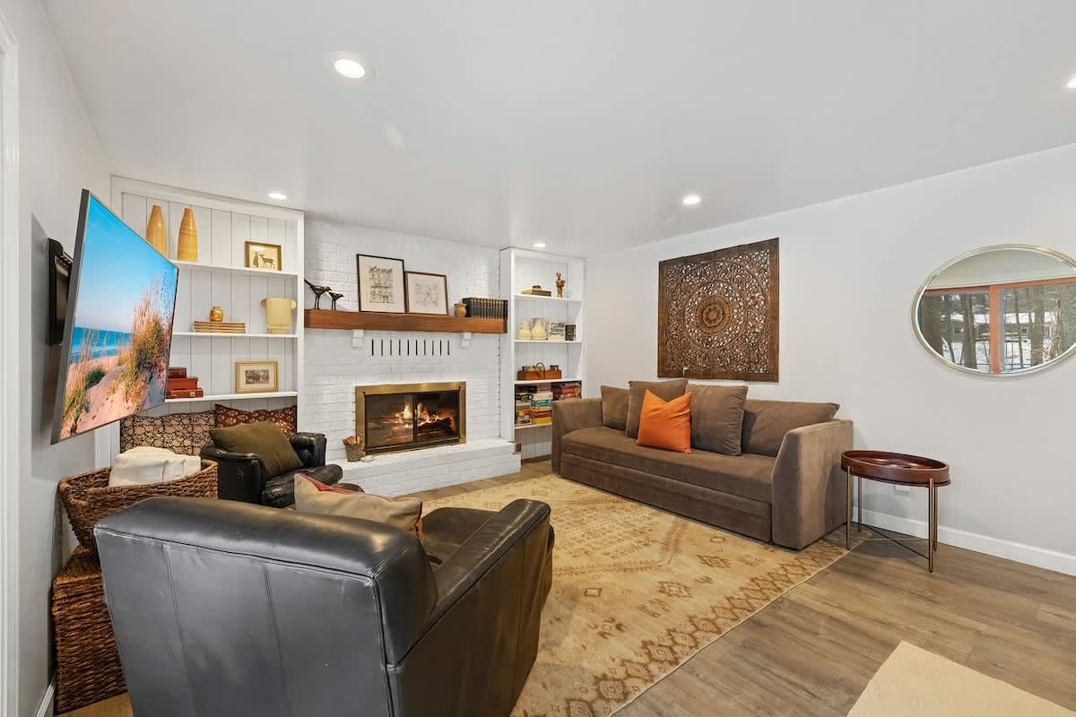 A fireside lounge with a pull-out sofa for flexible, easy stays.