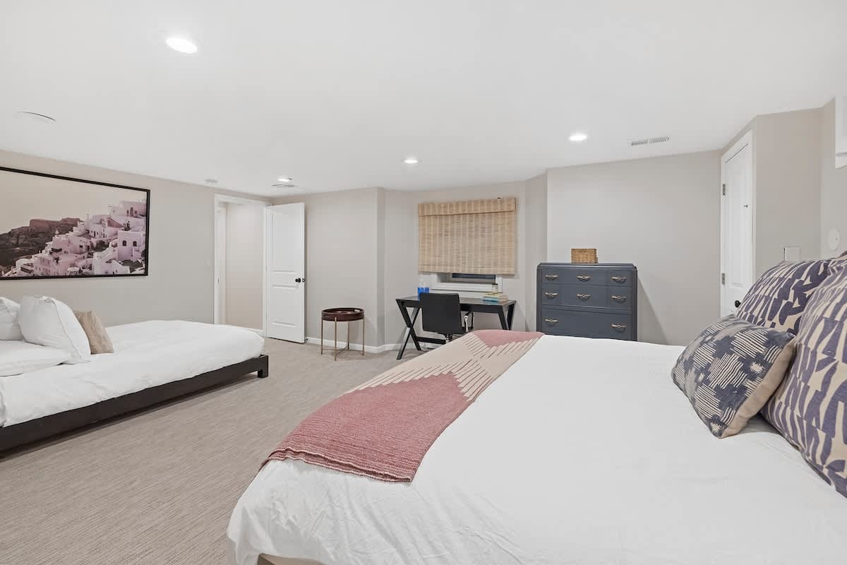 Settle in this large bedroom that offers together time for everyone.