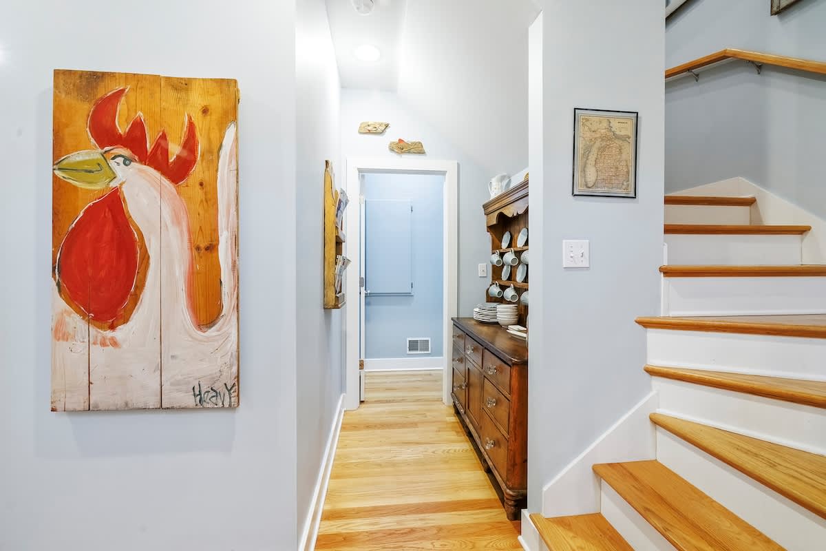 Easy flow between levels with artful Harbor Country touches.