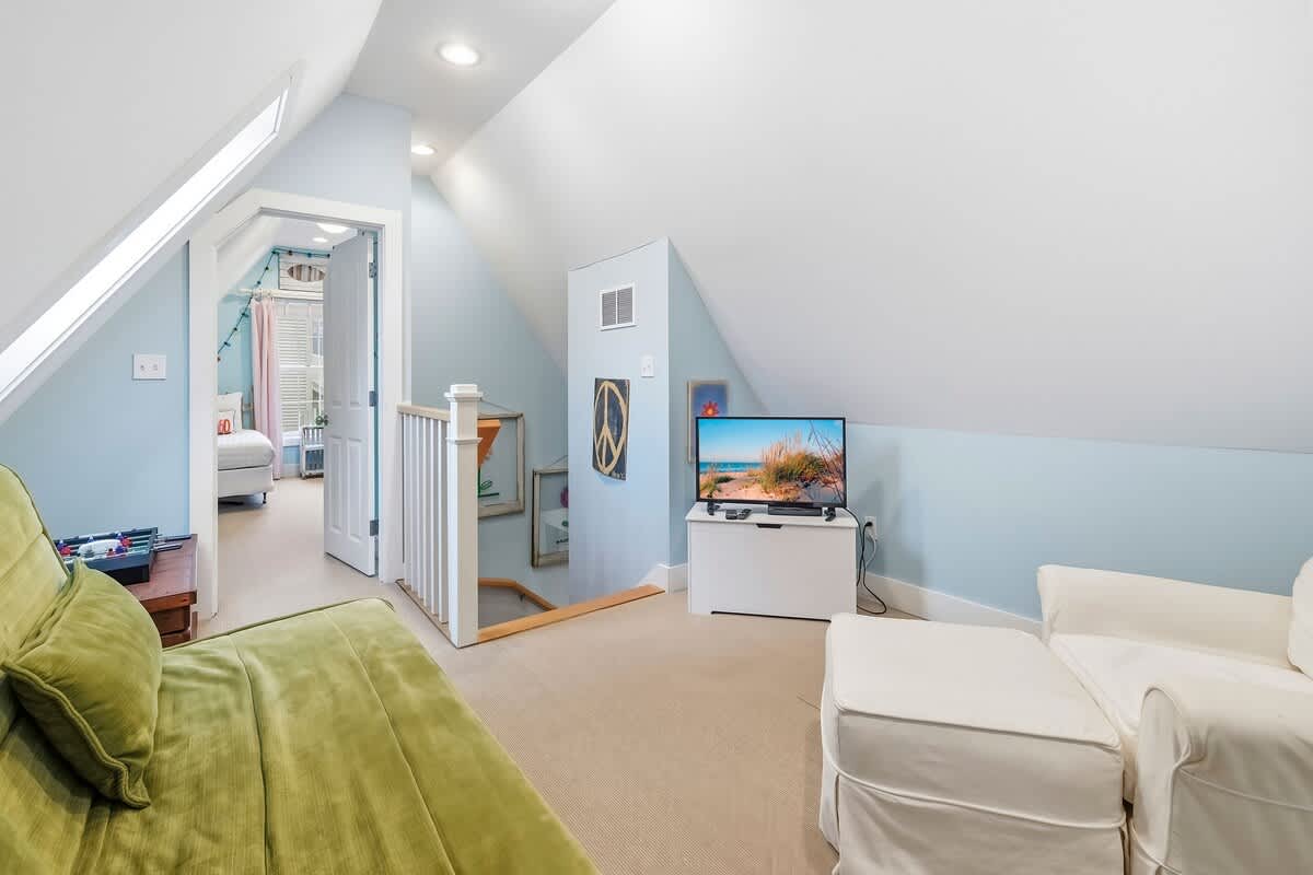 A cozy upper-level hangout made for unwinding together.