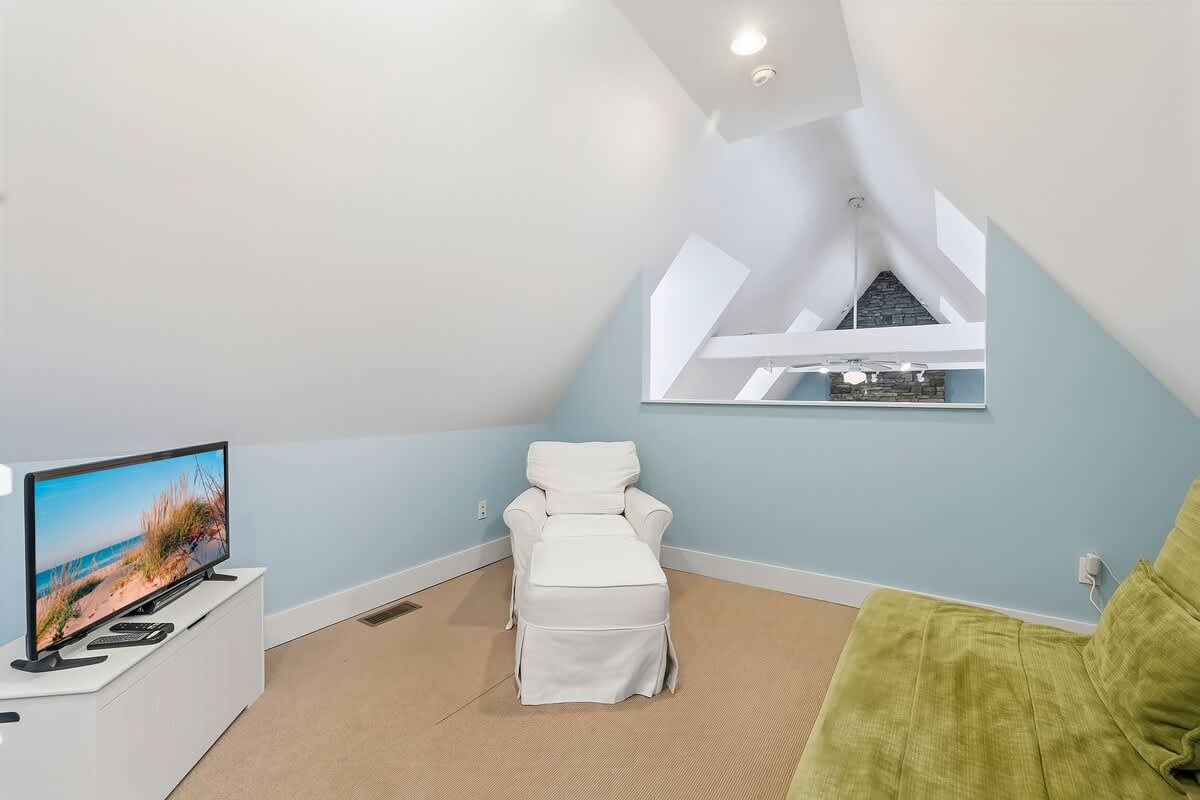 A peaceful loft nook for relaxing, movies, or nighttime snuggling.