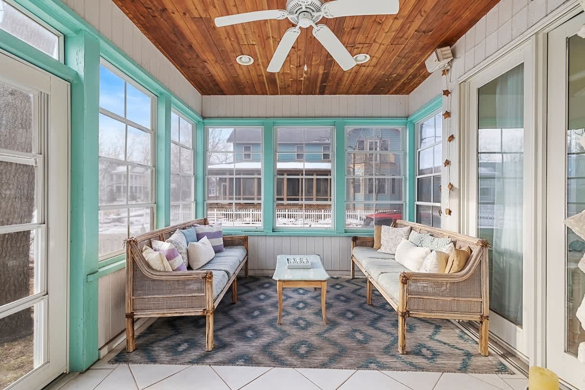 Lounge comfortably in our bright, coastal chic sunroom.