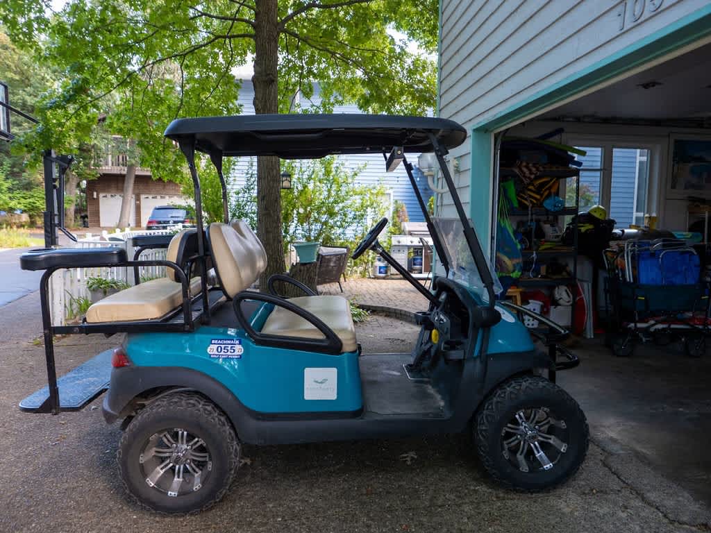 Seasonal golf cart included for neighborhood and beach access.