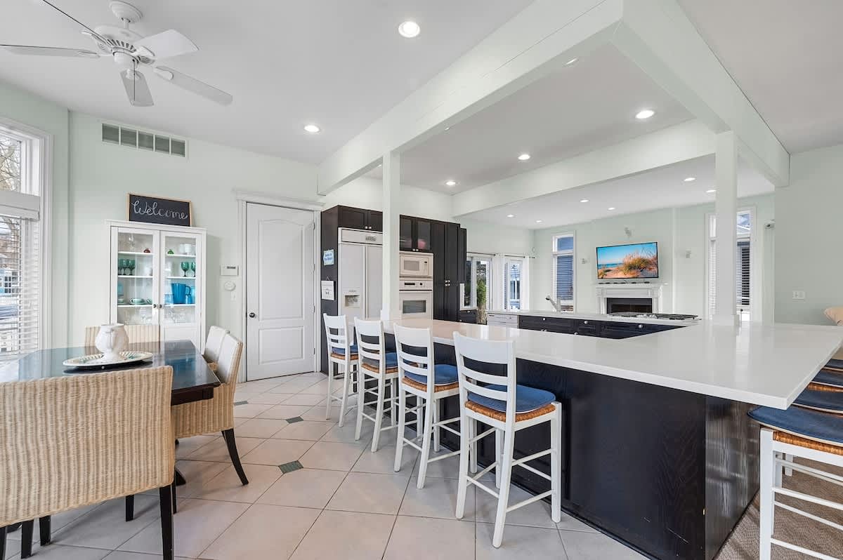 Cook together while everyone stays connected across the open living space.