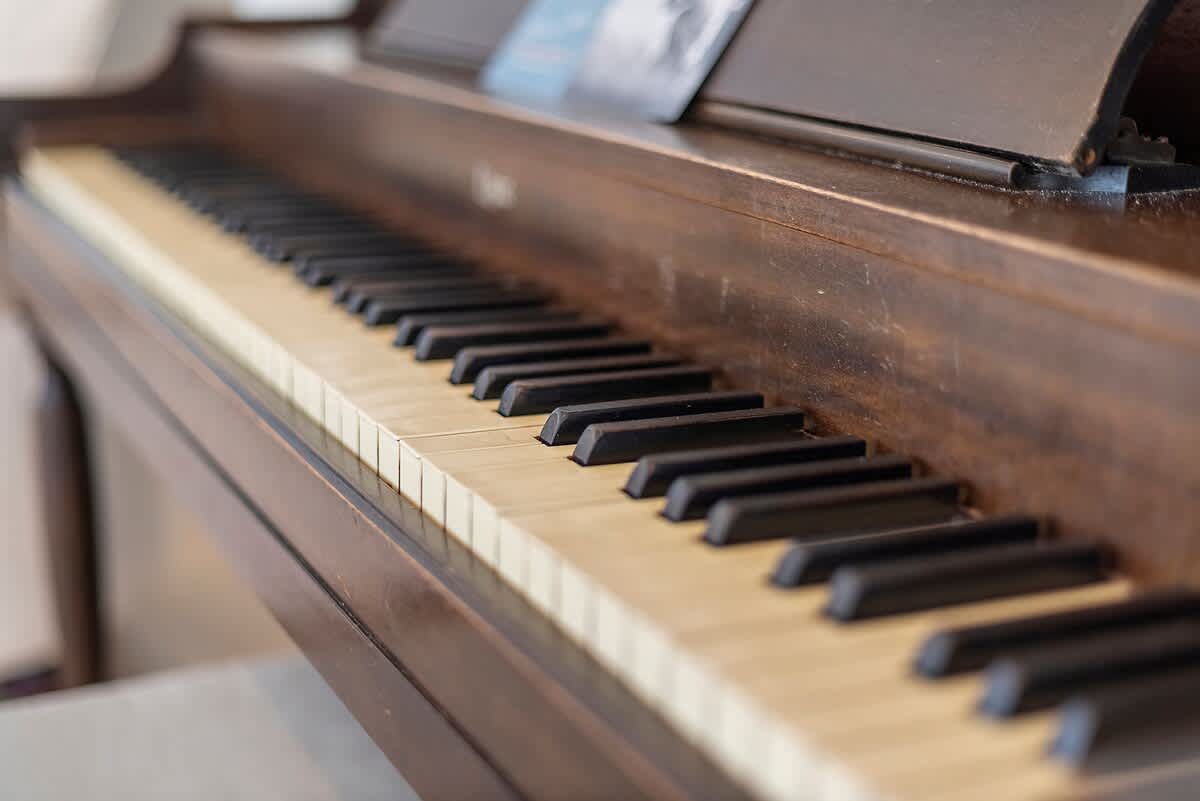 Play music on our piano as evenings slow down and the house settles in.