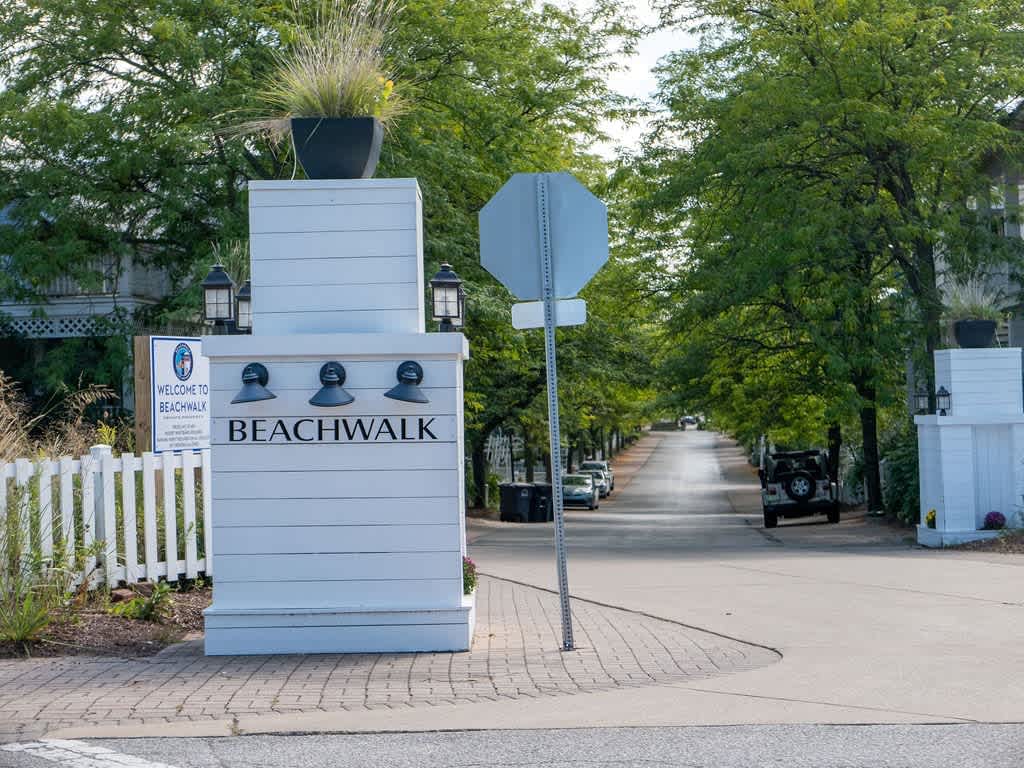 Enjoy Beachwalk Resort’s pools, courts, and private lake beach.