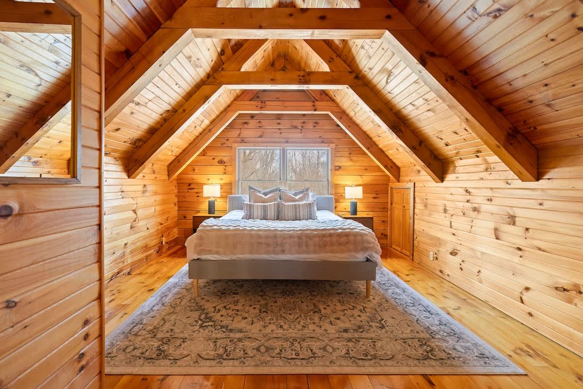 Bedroom 1 is on the upper level with king-sized bed.