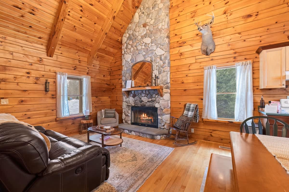 Welcome to warm wood interiors and inviting fireside seating.