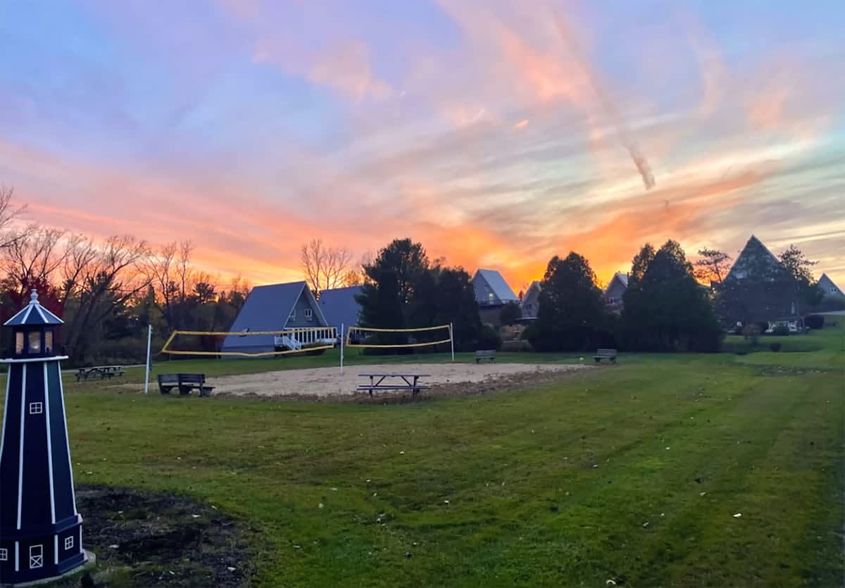 Feel the sand between your toes as you engage in a game of beach volleyball.