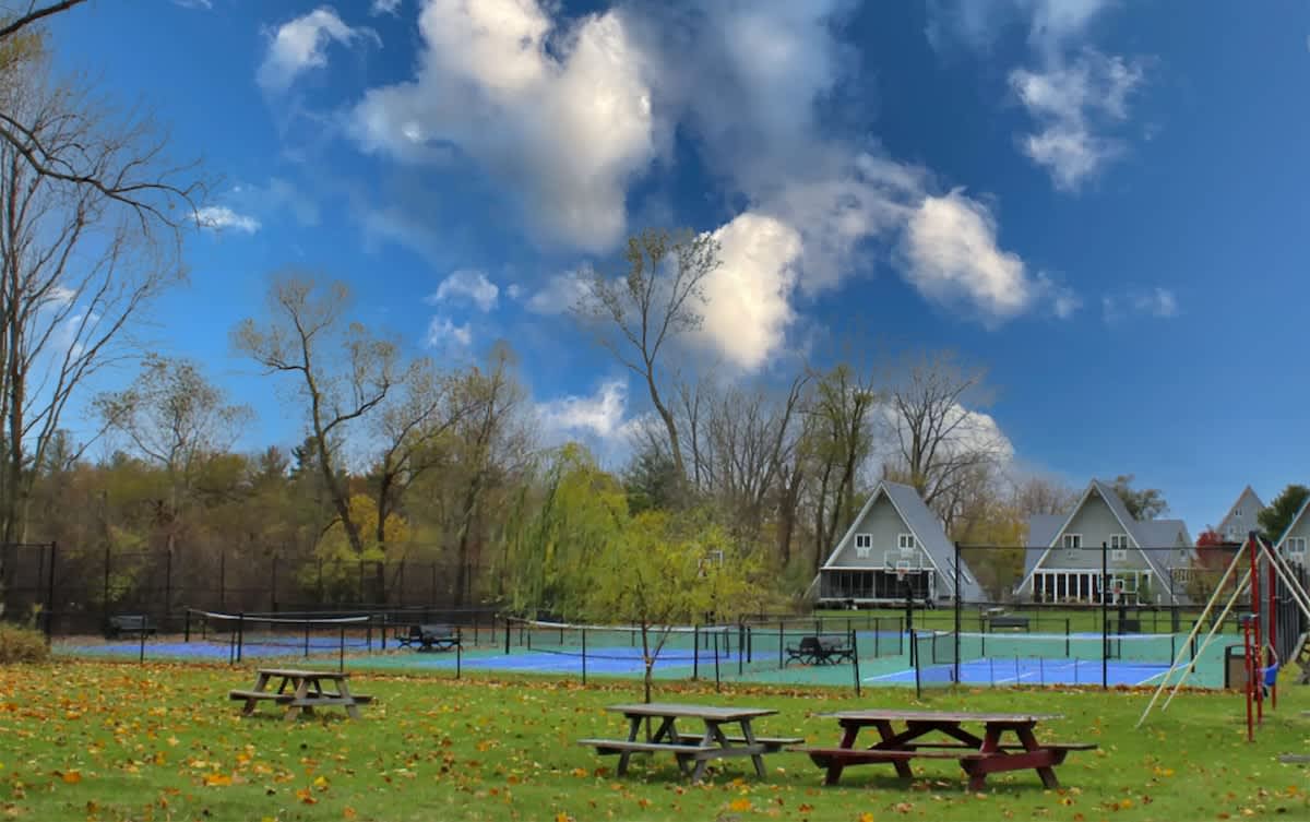 Enjoy sunny tennis matches or family picnic time on the lawn.