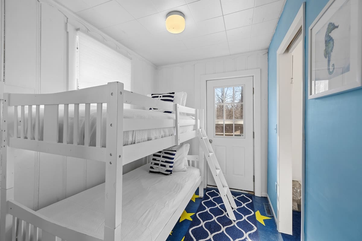 Bedroom 5 is on the upper level and has a single bunk bed.