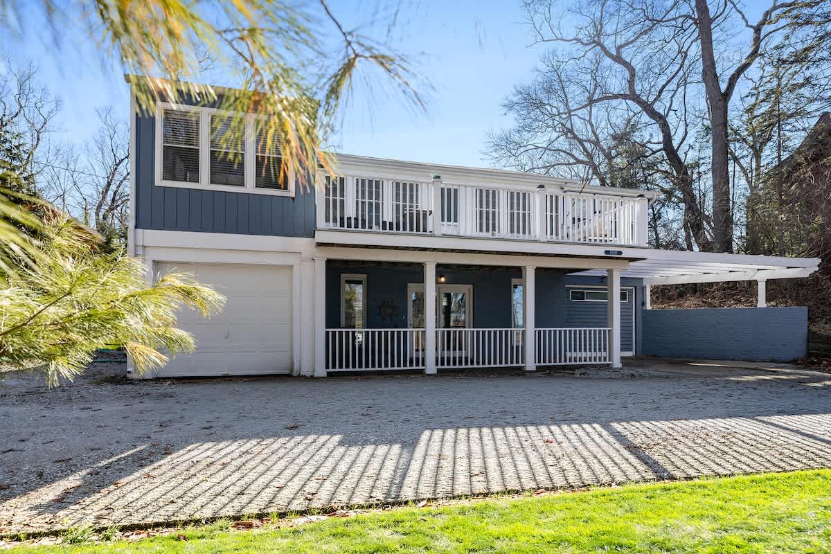 Welcome to Barefoot Cottage—your Grand Beach retreat steps to the lake.