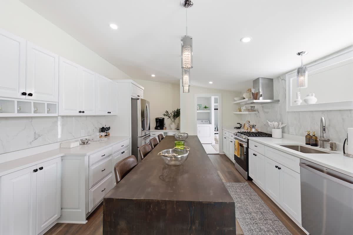 A long central island runs through the heart of the kitchen.