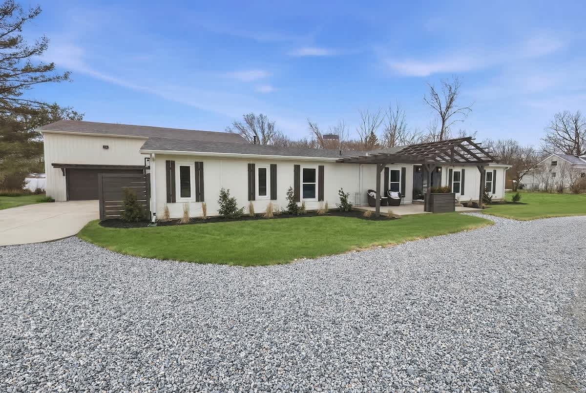 Cozy Haven sits on 2 acres in tje Three Oaks countryside.