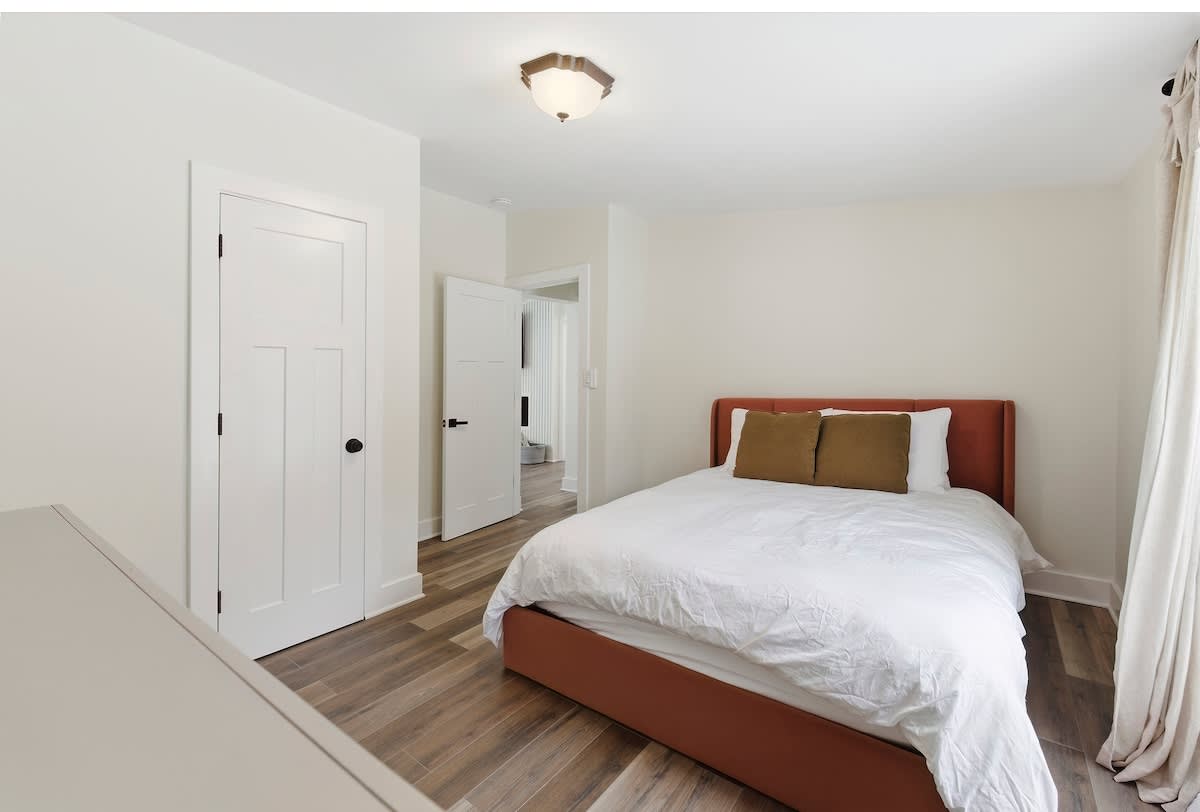 Bedroom 3 has a queen-sized bed