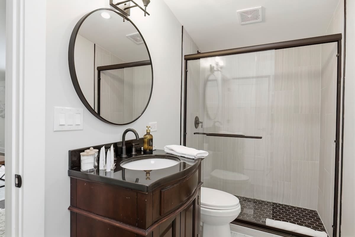 Clean lines and modern decor create a crisp, inviting space to get ready.