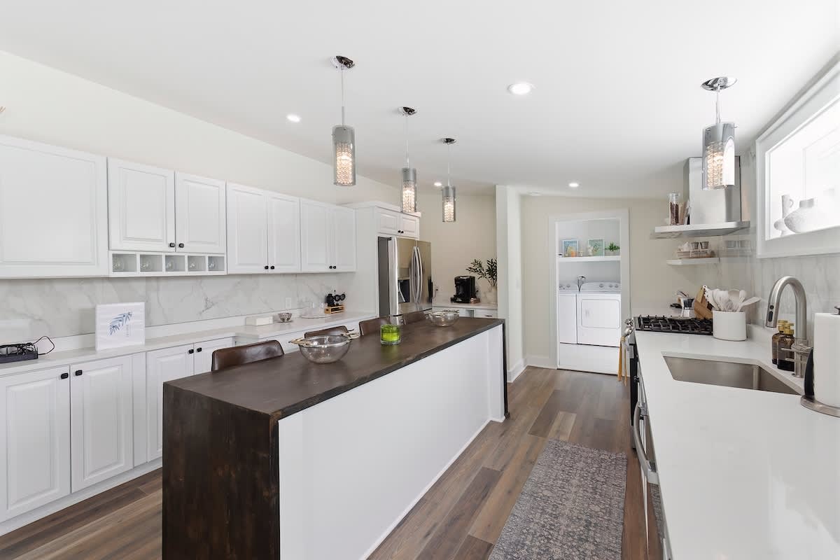 This chef’s kitchen features a massive island and high-end finishes.