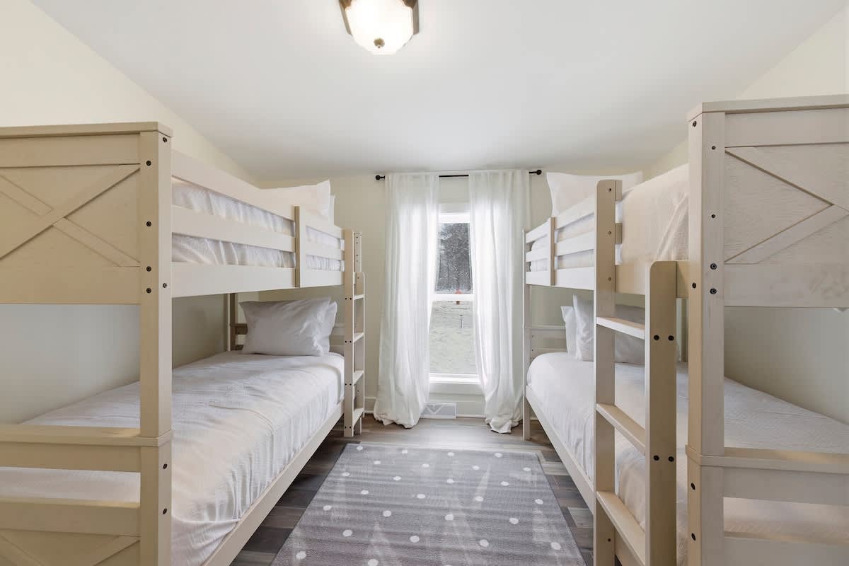 Bedroom 4 has 2 single bunk beds.
