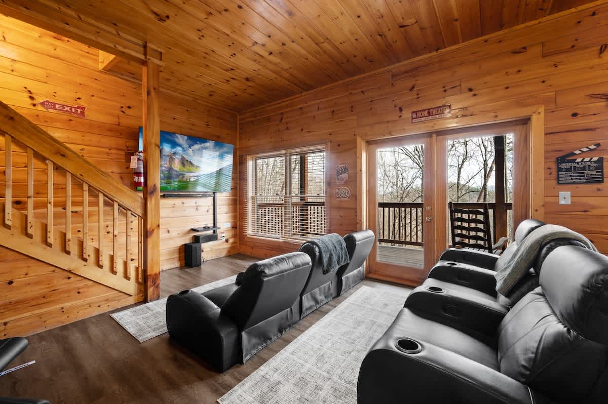 Theater room with GIANT 75" Roku (Smart) TV!  You can stream whatever you'd like!