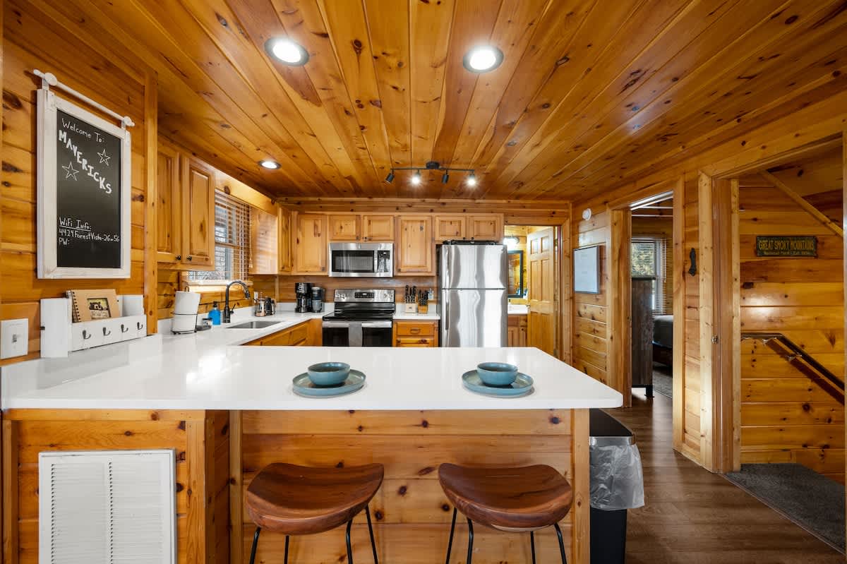 Gorgeous kitchen with quartz countertops that is well-stocked!