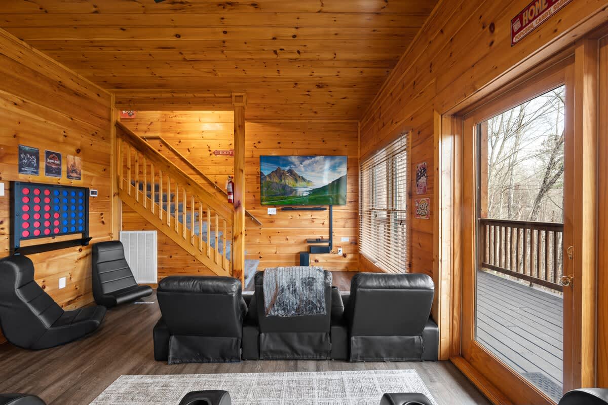 Theater room with GIANT 75" Roku (Smart) TV!  You can stream whatever you'd like!