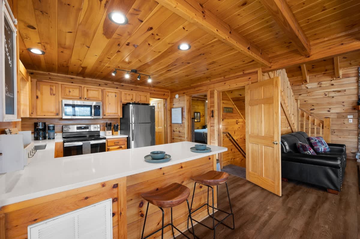 Gorgeous kitchen with quartz countertops that is well-stocked!