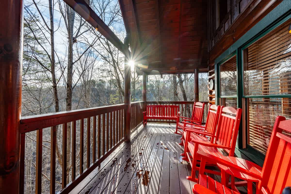 New polywood benches and rocking chairs at the main level, adjacent to the hot tub so you can enjoy the view off the back deck!