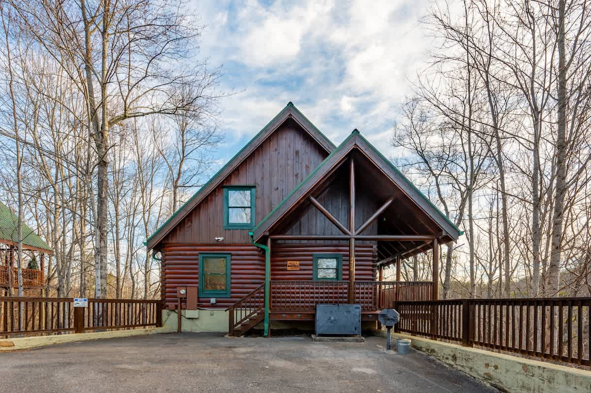 Ample parking for three (3) vehicles in front, with additional overflow parking available.  Charcoal grill available for guests to use!