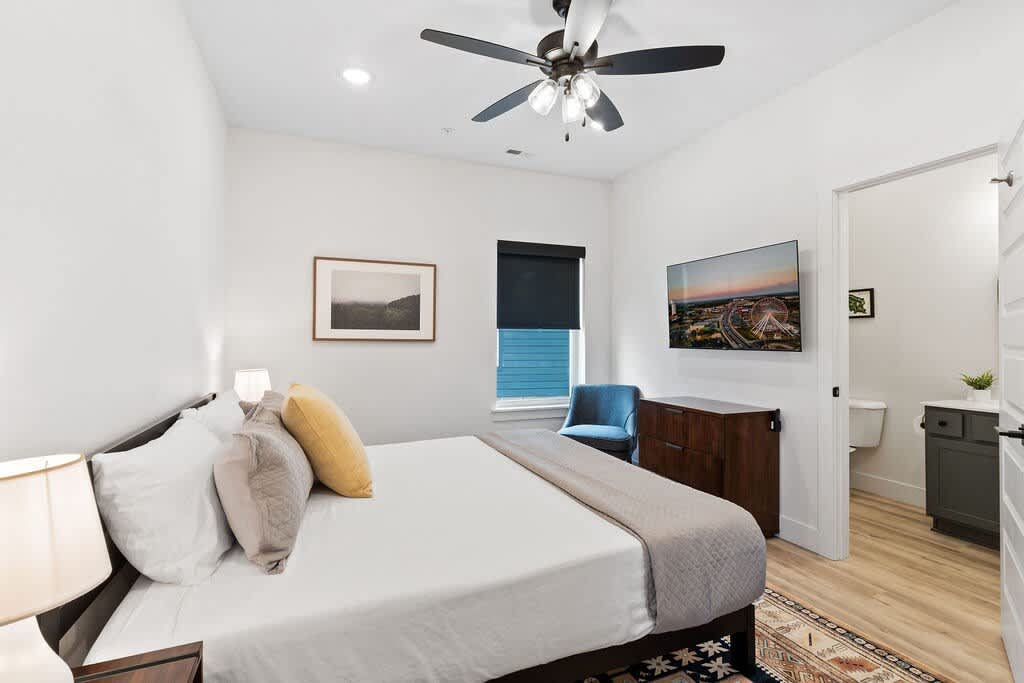Downstairs King Bedroom (with reading chair and small computer table)