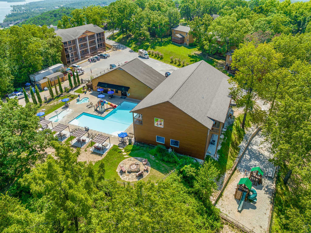 Bird's Eye view of Community Indoor and Outdoor Pool, Playground, and Fire Pit