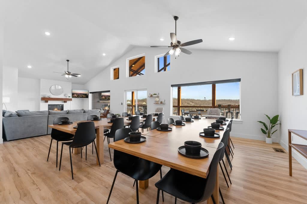 Dining Area - Seats twenty (20) at tables with two (2) high-chairs, and five (5) more at the kitchen island.