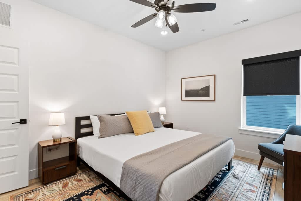 Downstairs King Bedroom (with reading chair and small computer table)