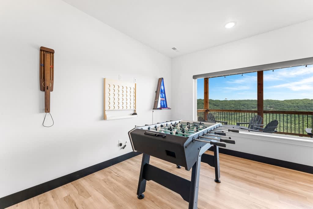 Try Boss Toss, the wall mounted bean bag toss game!  You'll love it!