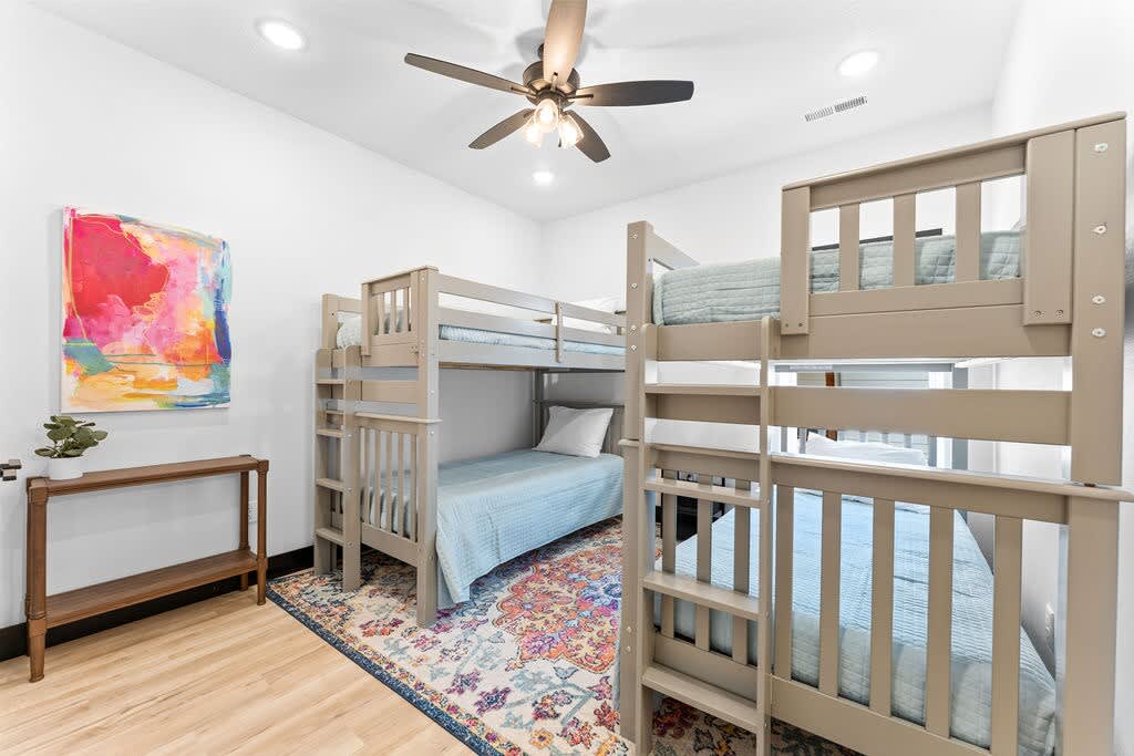 Bunk room with four (4) twin beds!  This room has a multi-device charger for all the smart phones.  And...of course, a white noise machine.