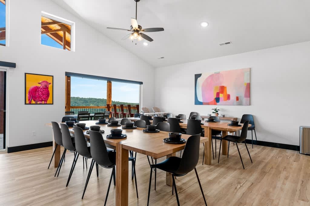 The dining room has seats for twenty two (22) with bar stools for an additional five (5) seats - TOTAL twenty seven (27)!